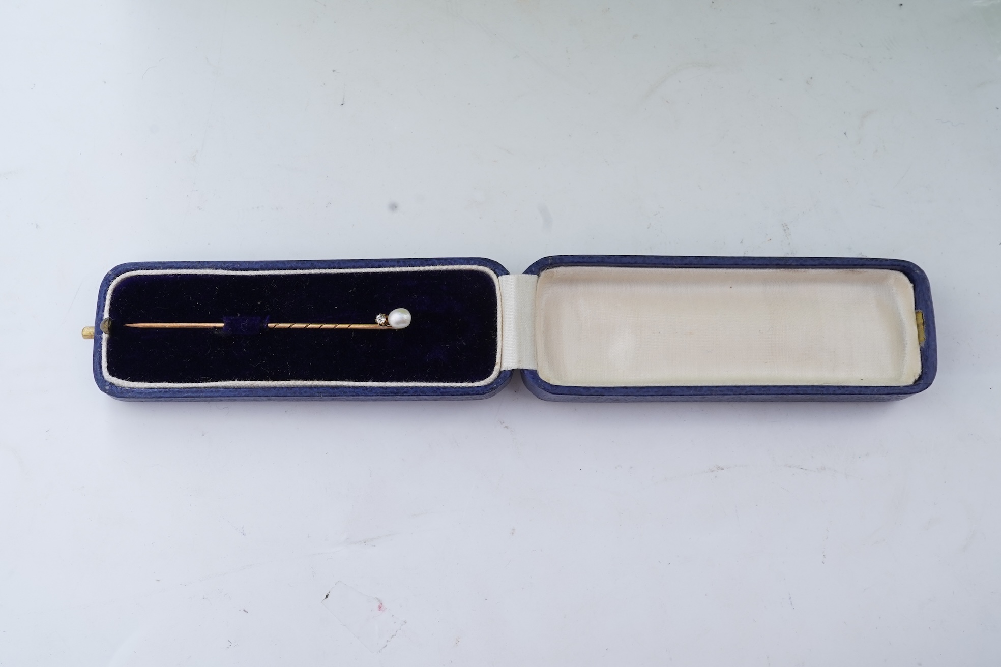 Two cameos and a stick pin, 19th century
